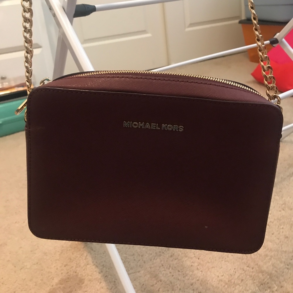 Michael Kors maroon leather camera bag style